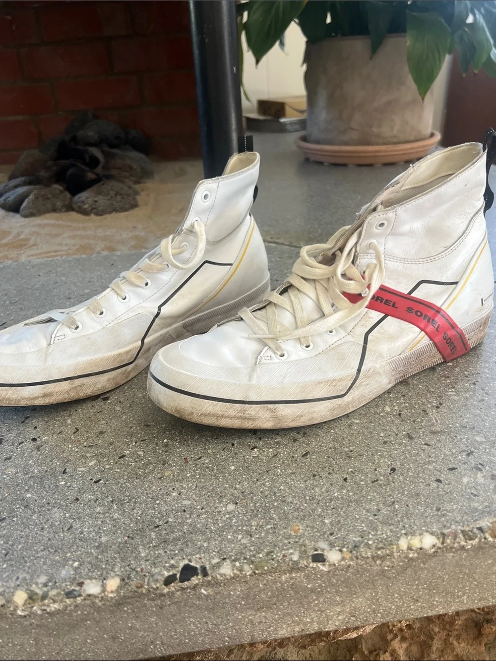 Sorel White High-Top Sneakers with Red Accent